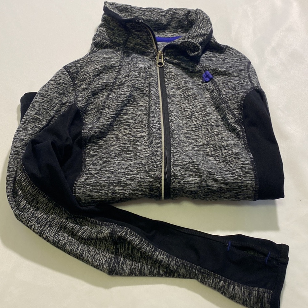 Tangerine woman’s activewear jacket size S.